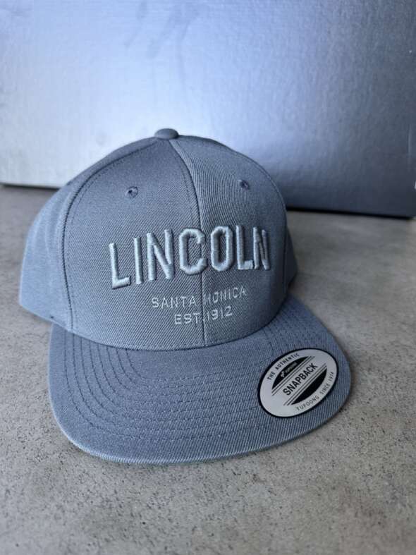 Charcoal Flat Brimmed Hat with Lincoln Wordmark